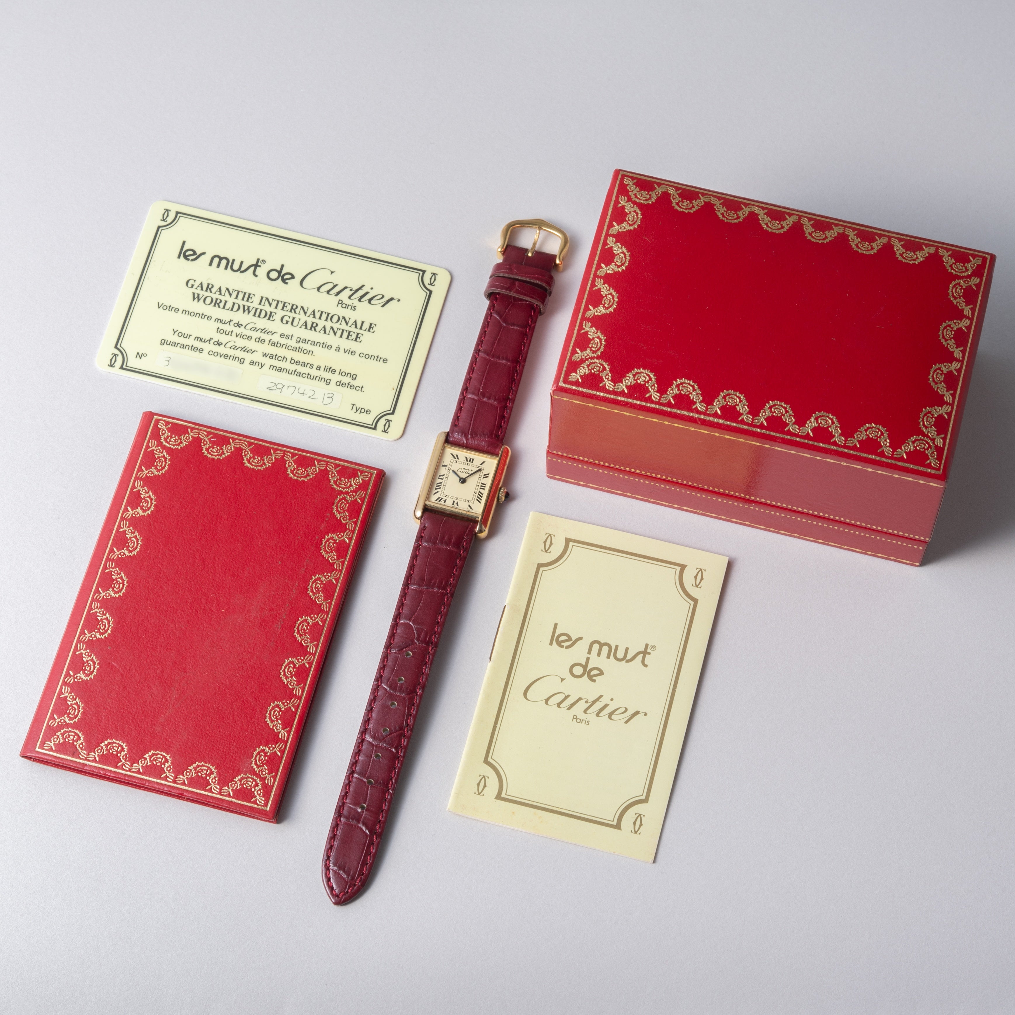 カルティエ マストタンク SMサイズ 手巻き 1980年代製 アイボリーローマンダイヤル 箱・ギャラ付き