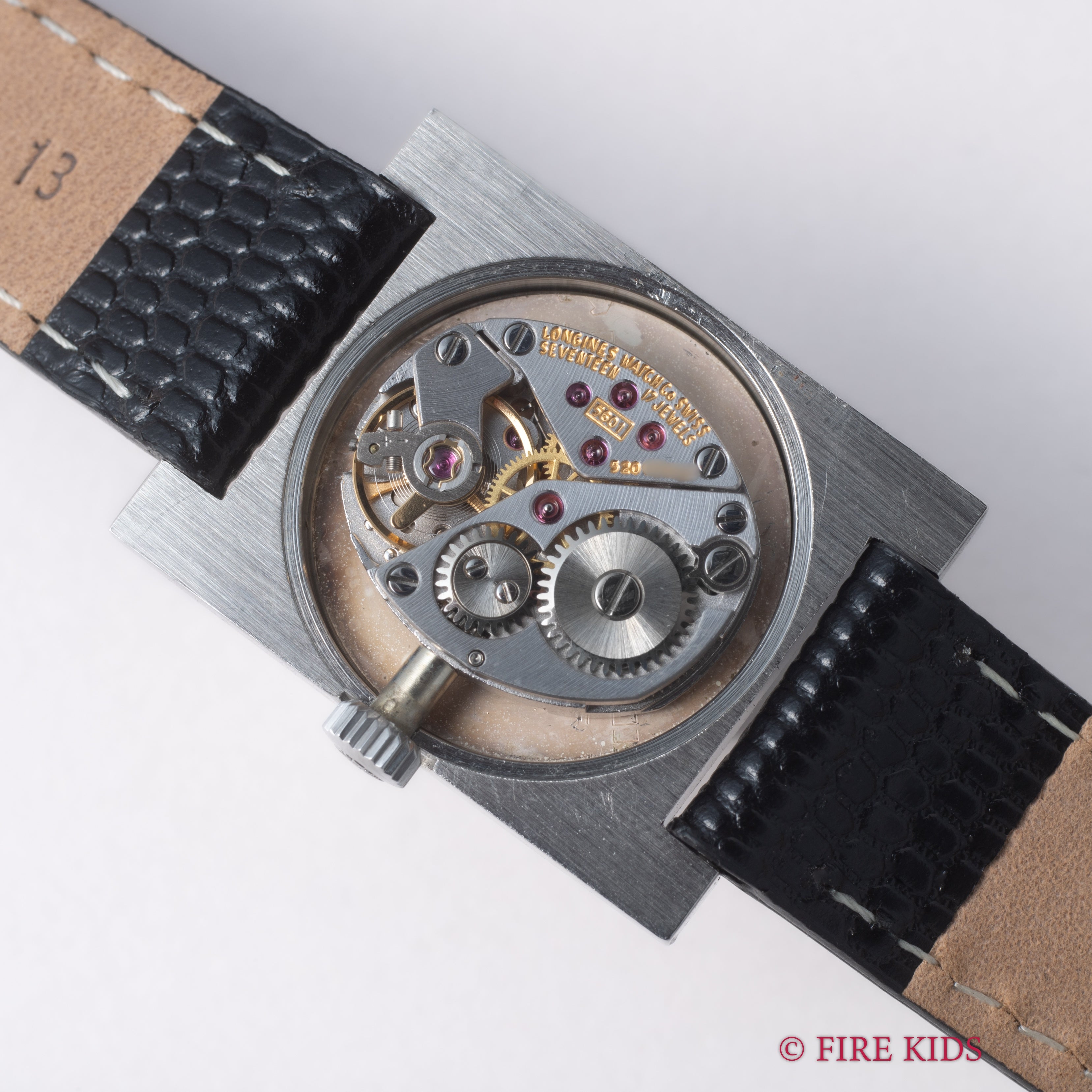 ロンジン コンクエスト レクタンギュラー シルバーローマンダイヤル 1970年代製 純正尾錠付き 薄型手巻き