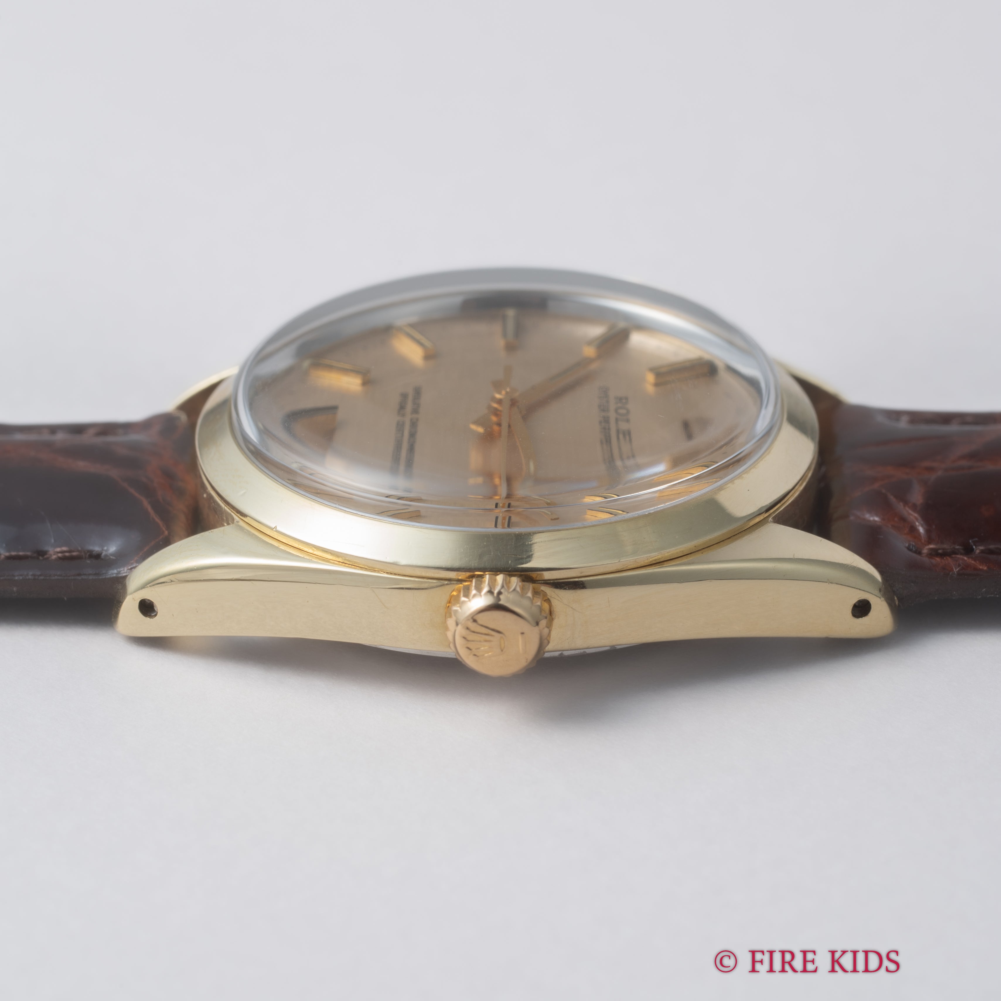 ロレックス 1969年製 オイスターパーペチュアル シャンパンブリックダイヤル トップゴールドケース Ref.1024