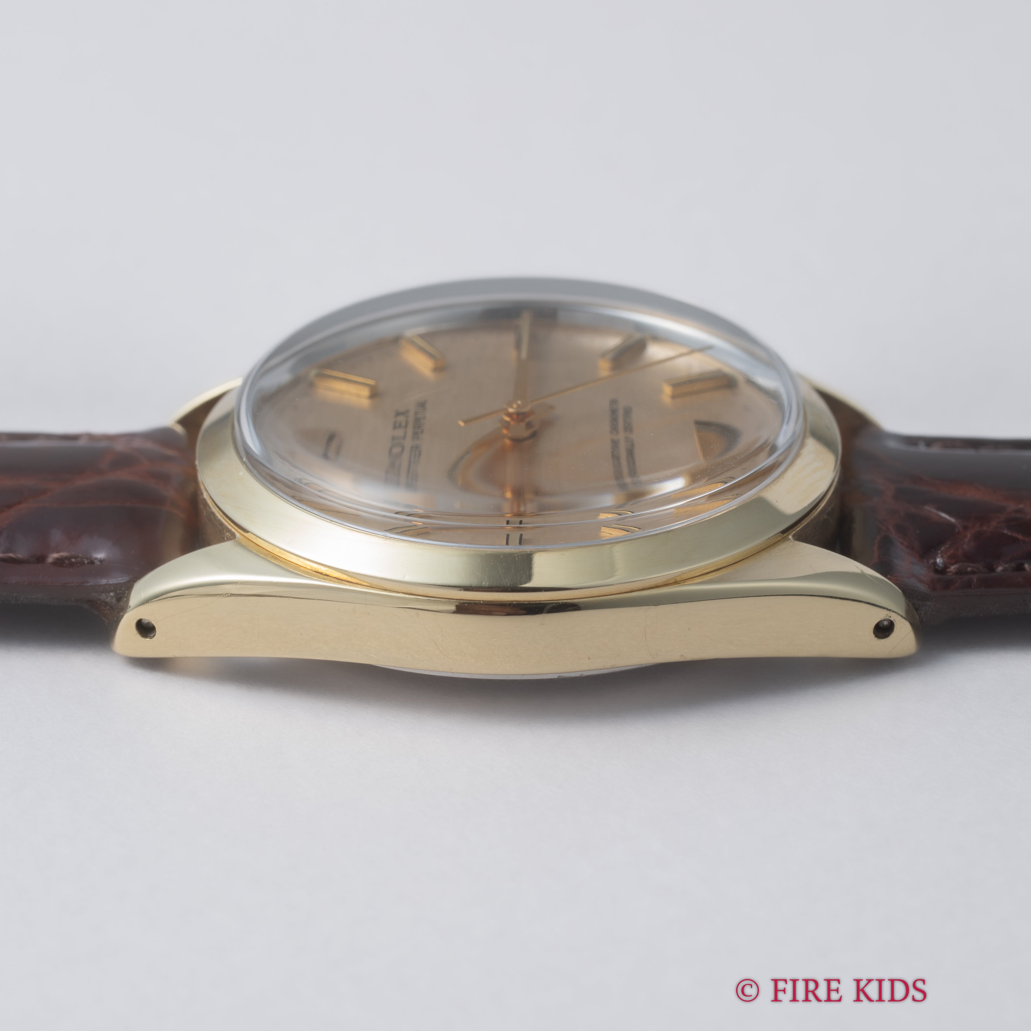 ロレックス 1969年製 オイスターパーペチュアル シャンパンブリックダイヤル トップゴールドケース Ref.1024