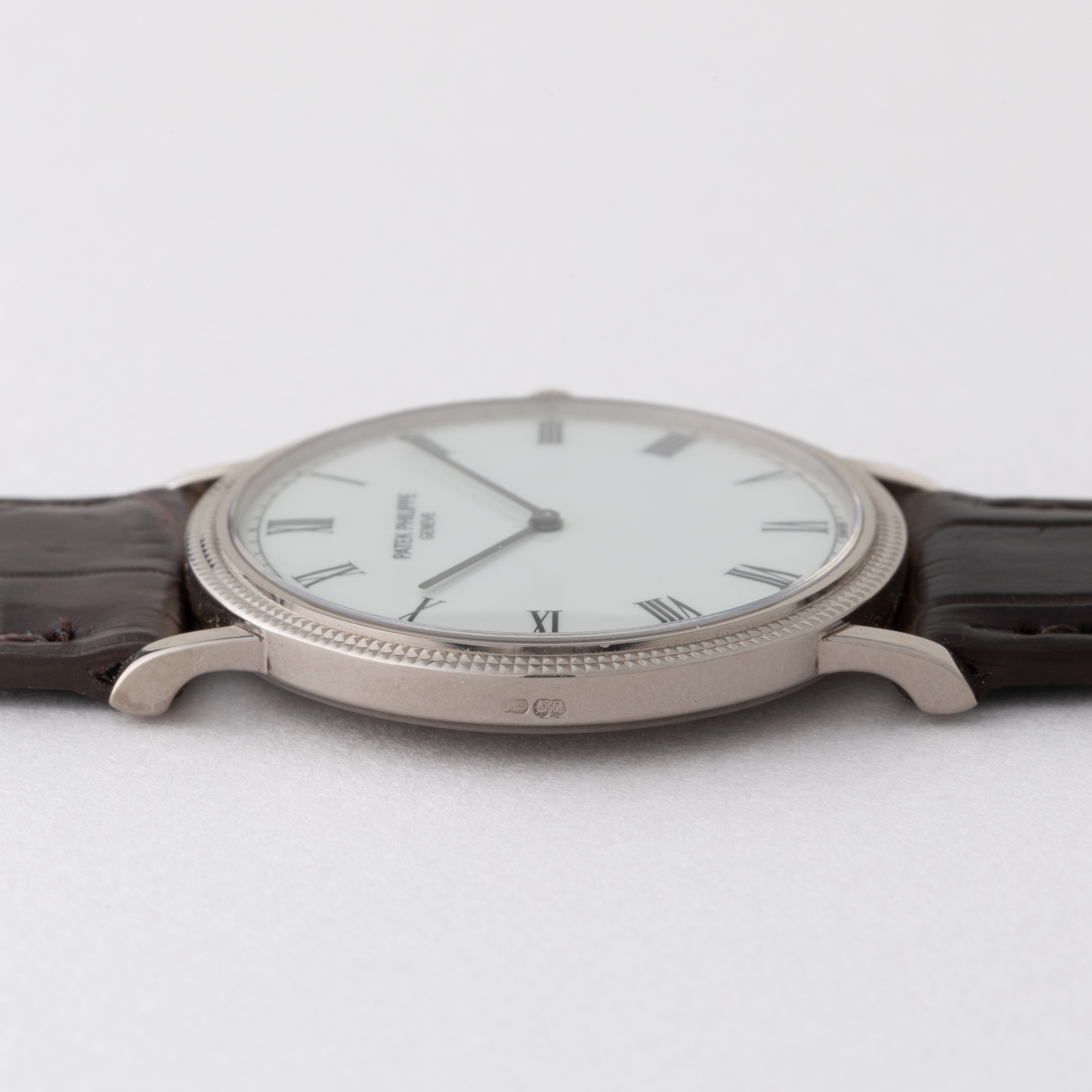 パテックフィリップ 1990年代製 18KWG ラウンドケース ホワイトローマンダイヤル 手巻き 純正中古革ベルト付き