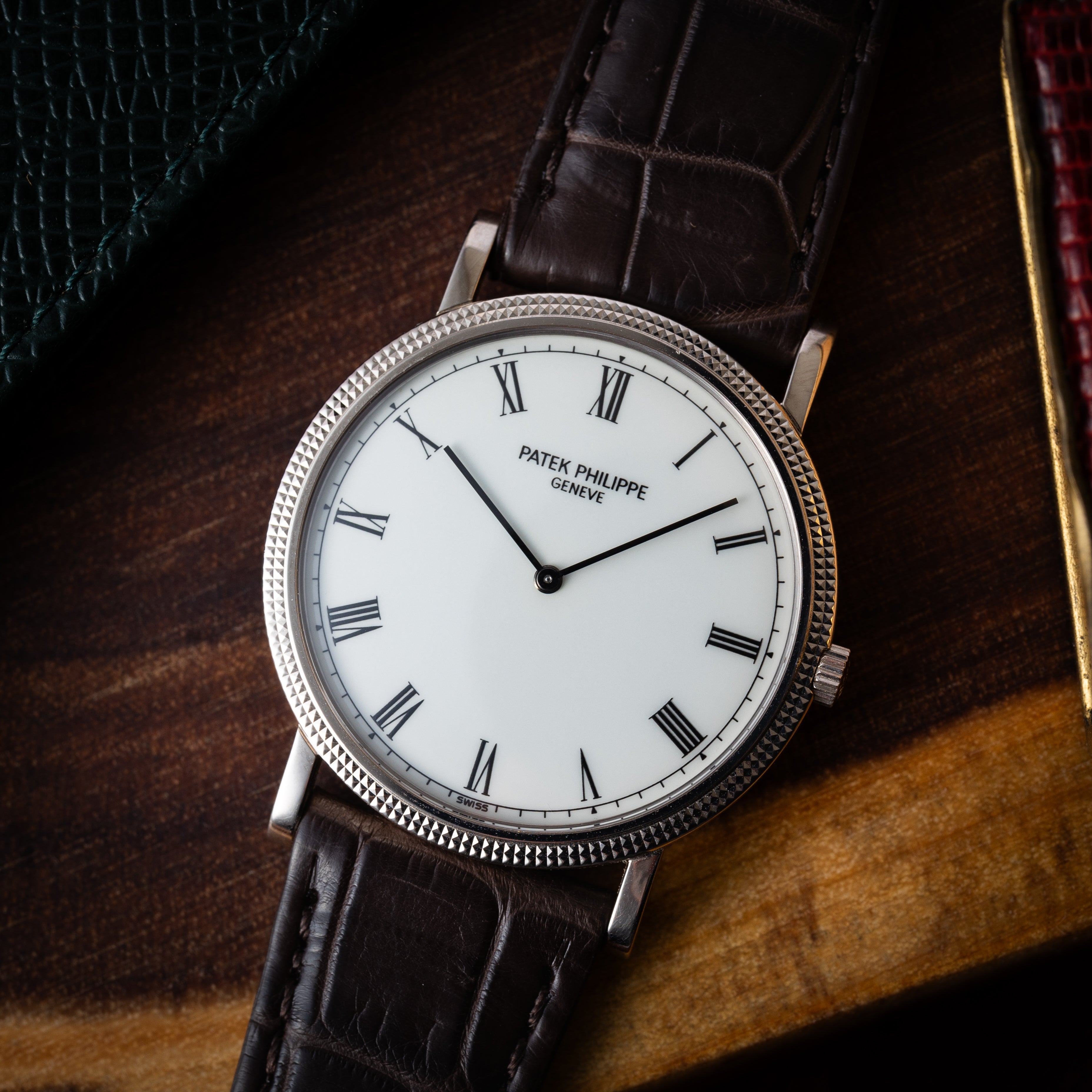 パテックフィリップ 1990年代製 18KWG ラウンドケース ホワイトローマンダイヤル 手巻き 純正中古革ベルト付き