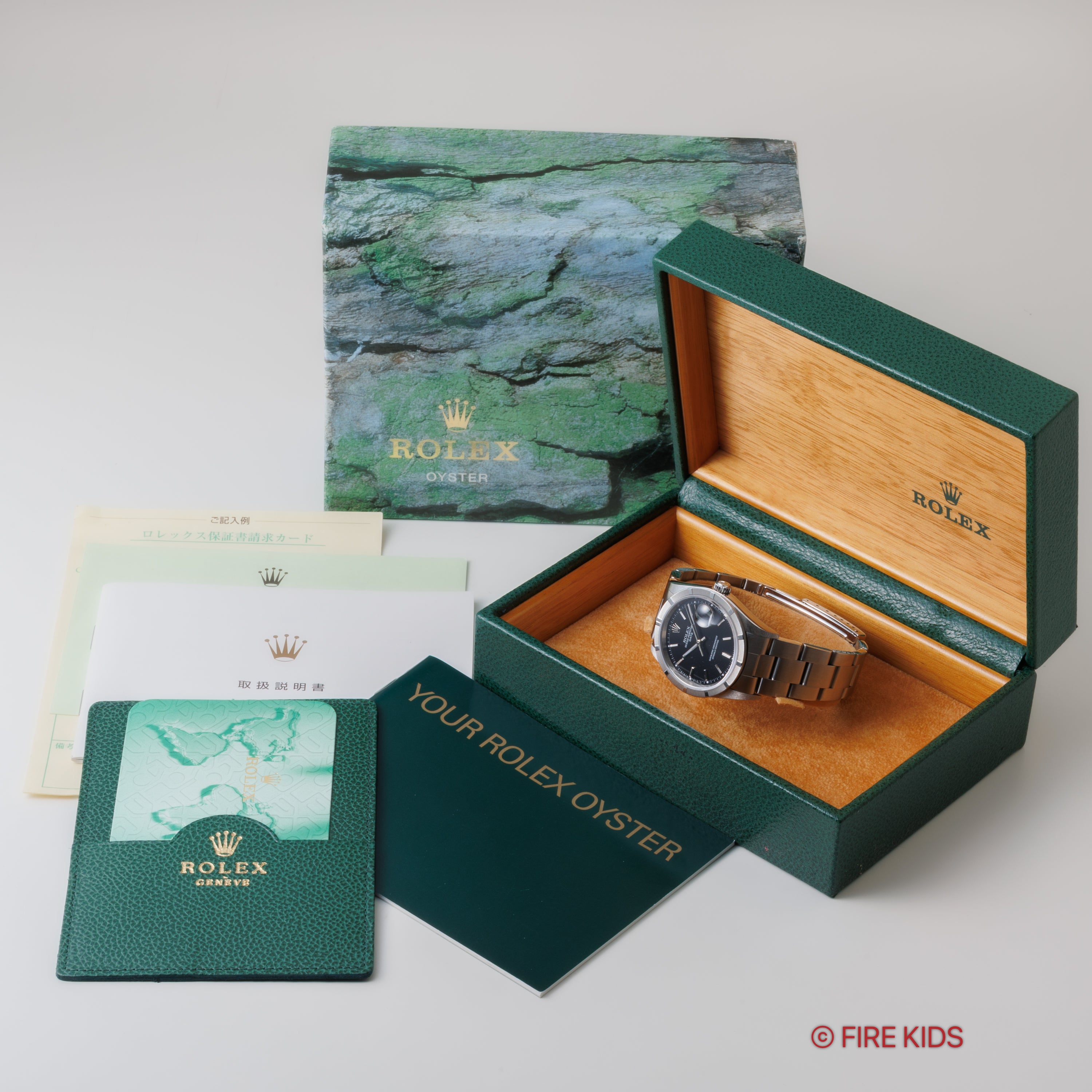 ロレックス オイスターパーペチュアルデイト 2002年製 Ref.15210 ブラックダイヤル 箱、冊子付き