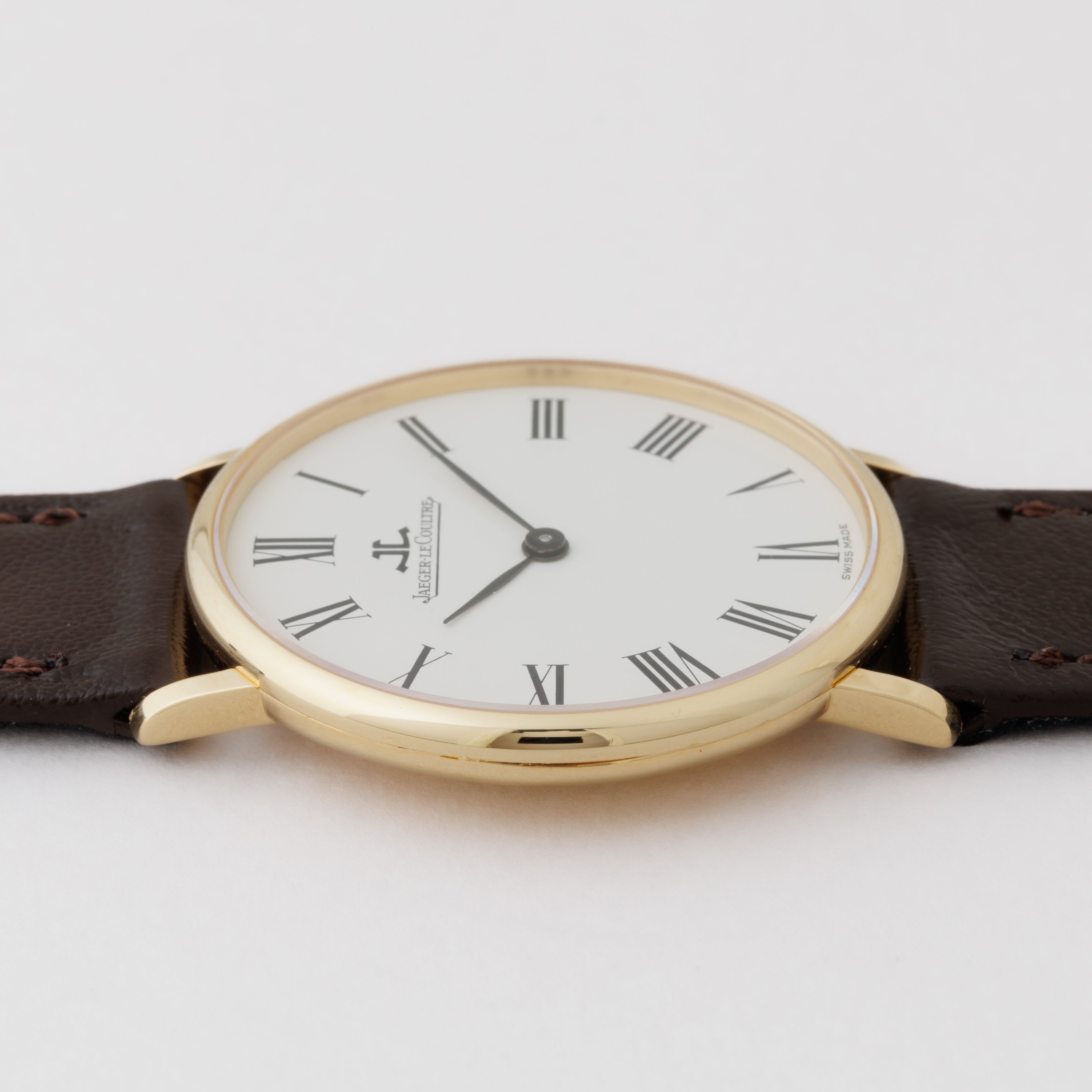 ジャガー・ルクルト ラウンド ホワイトローマンダイヤル 1960年代 18金無垢 手巻き Ref.9124-21 Cal.818/3 純正尾錠付き