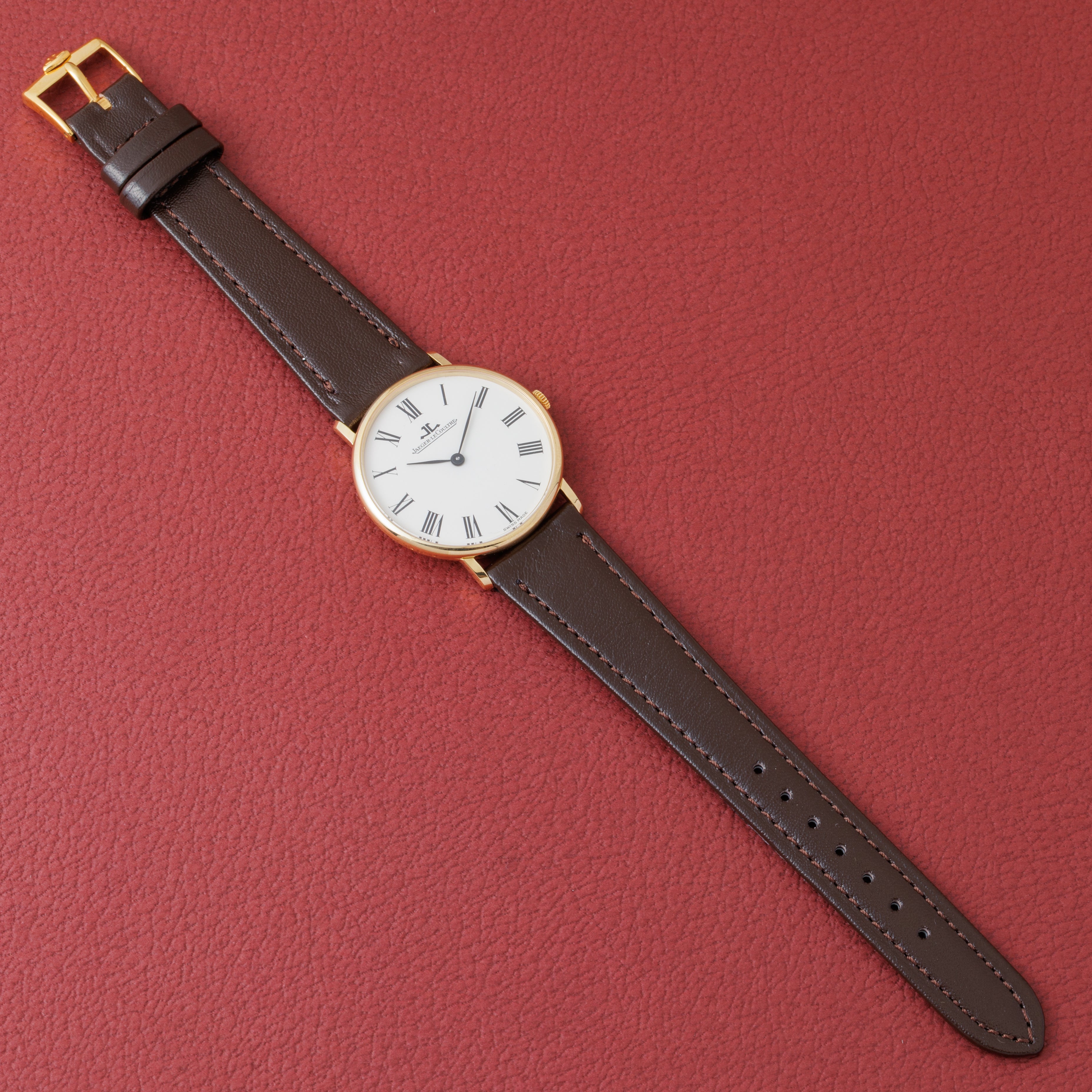 ジャガー・ルクルト ラウンド ホワイトローマンダイヤル 1960年代 18金無垢 手巻き Ref.9124-21 Cal.818/3 純正尾錠付き