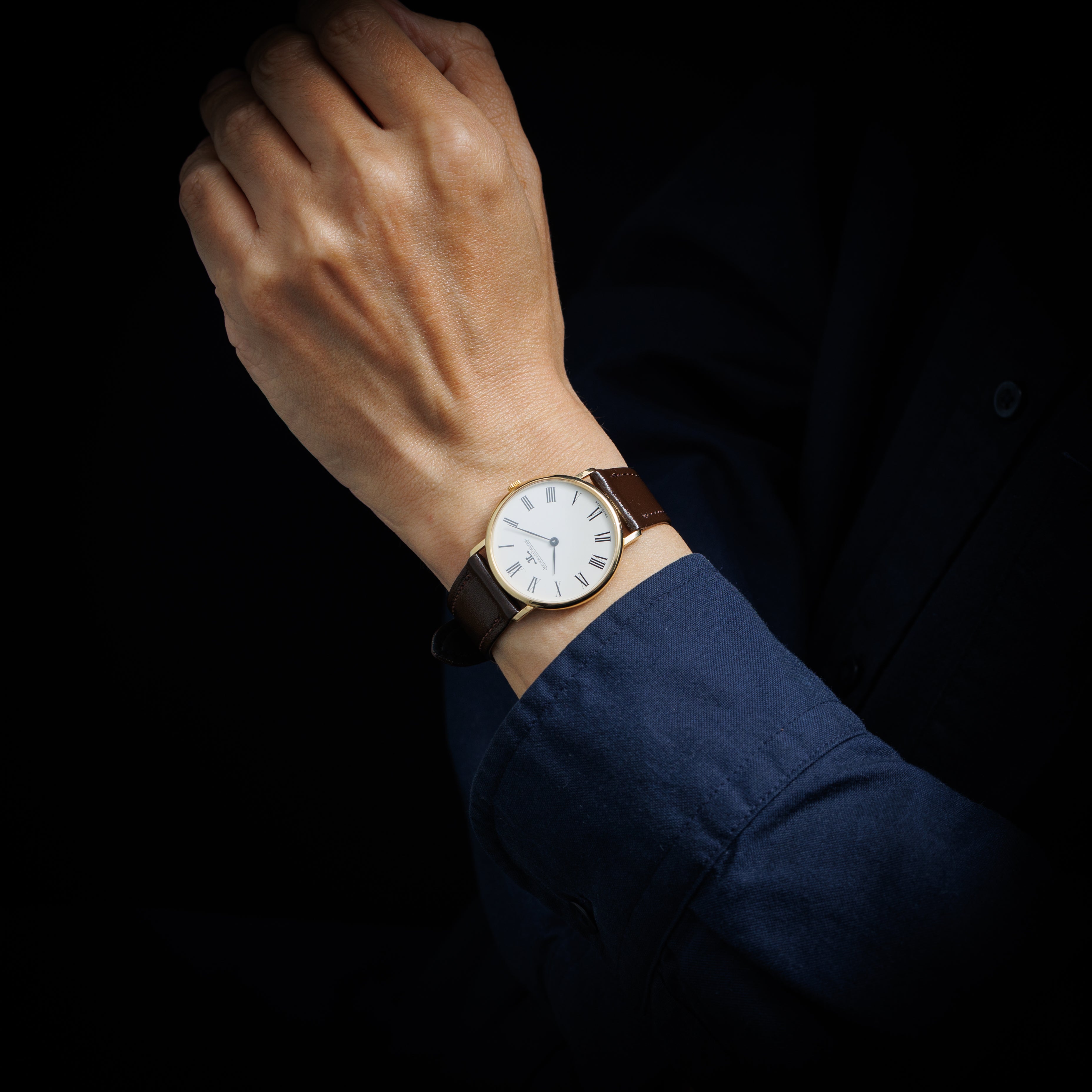 ジャガー・ルクルト ラウンド ホワイトローマンダイヤル 1960年代 18金無垢 手巻き Ref.9124-21 Cal.818/3 純正尾錠付き