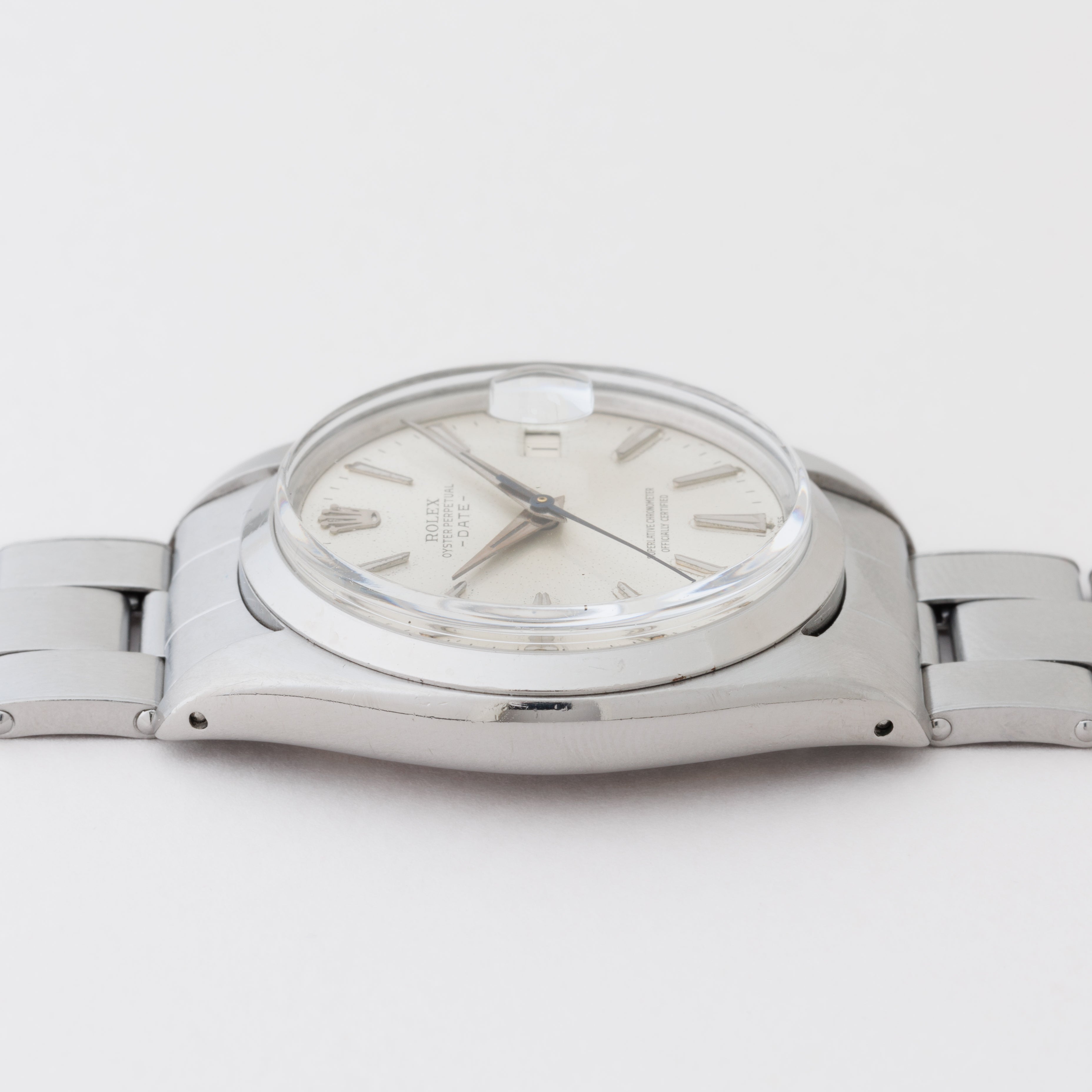 ロレックス 1961年製 オイスターパーペチュアルデイト Ref.1500 ドーフィンハンド 純正リベットブレス