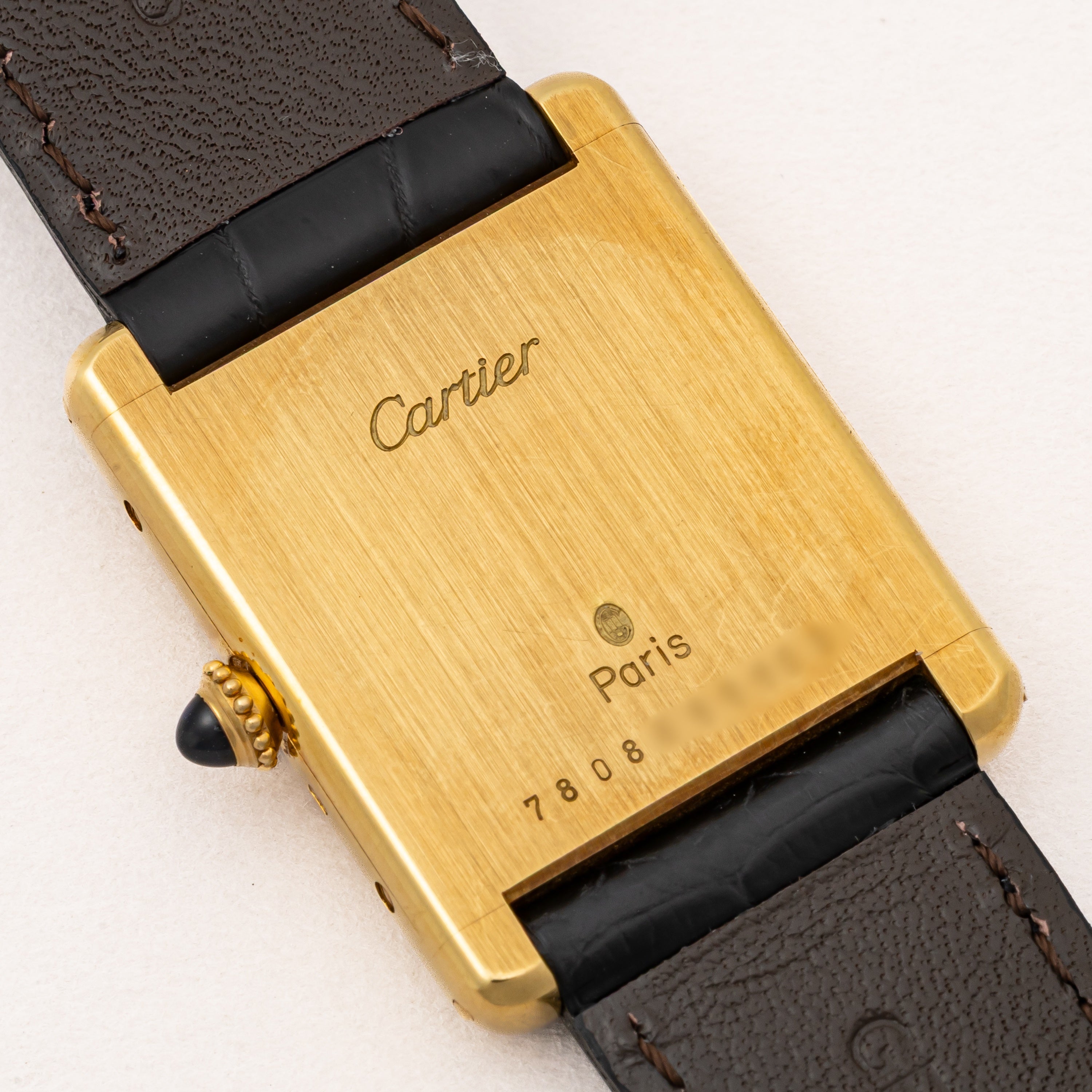 カルティエ タンクルイ18金無垢LMサイズ PARISダイヤル 手巻 1984年ギャラ、箱付き Ref.7808 純正金無垢尾錠付き