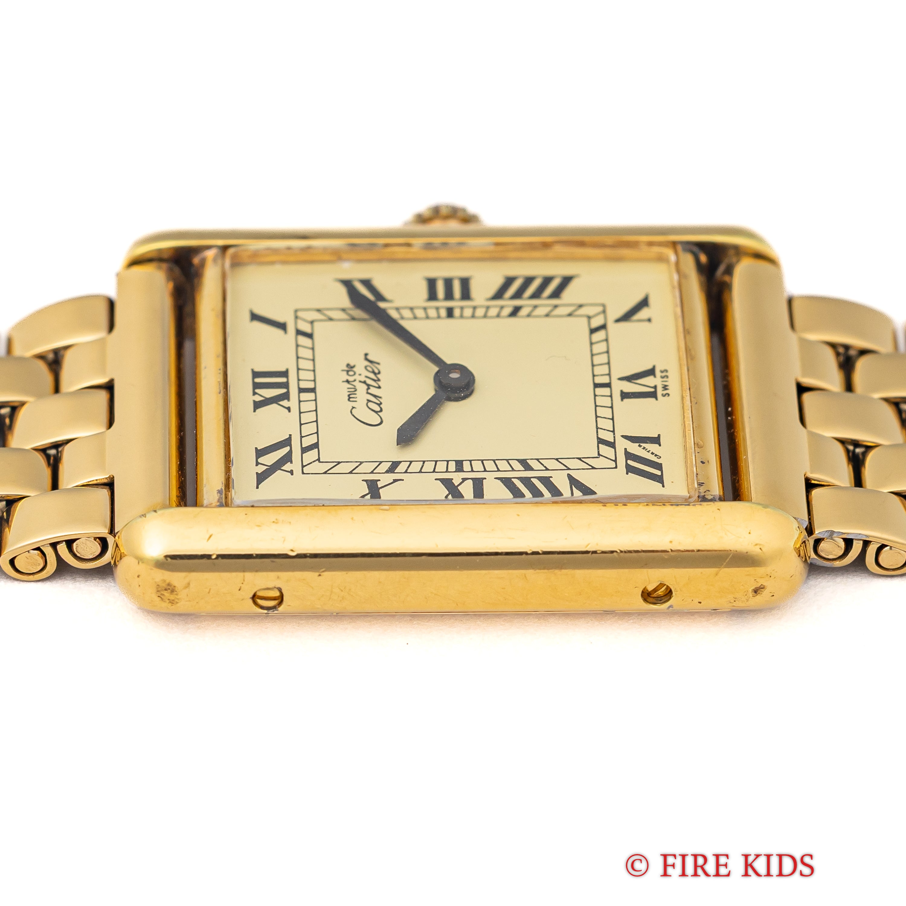 カルティエ マストタンク LMサイズ アイボリーローマン 手巻き 1980年代製 ギャランティー、冊子、ポーチ付き