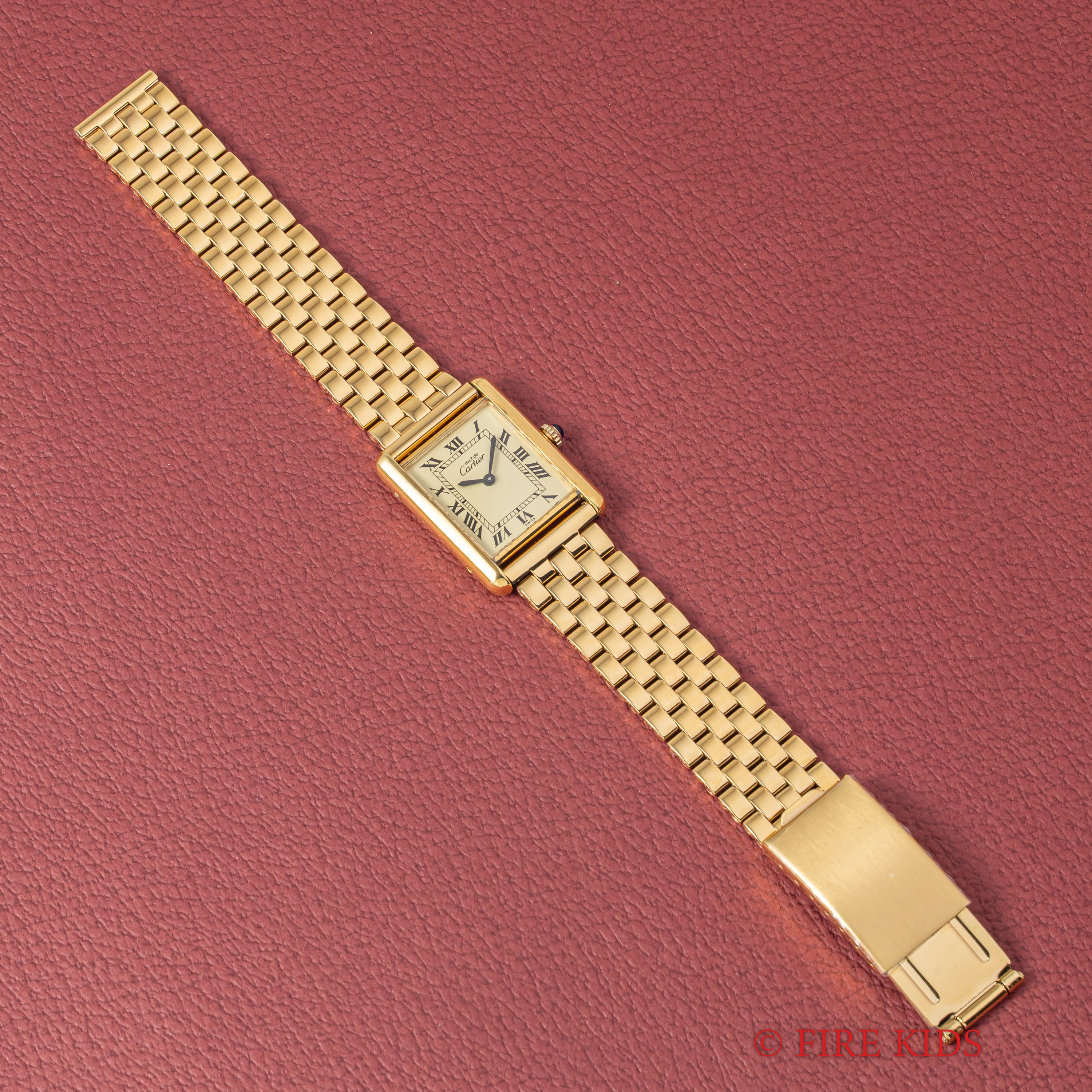 カルティエ マストタンク LMサイズ アイボリーローマン 手巻き 1980年代製 ギャランティー、冊子、ポーチ付き