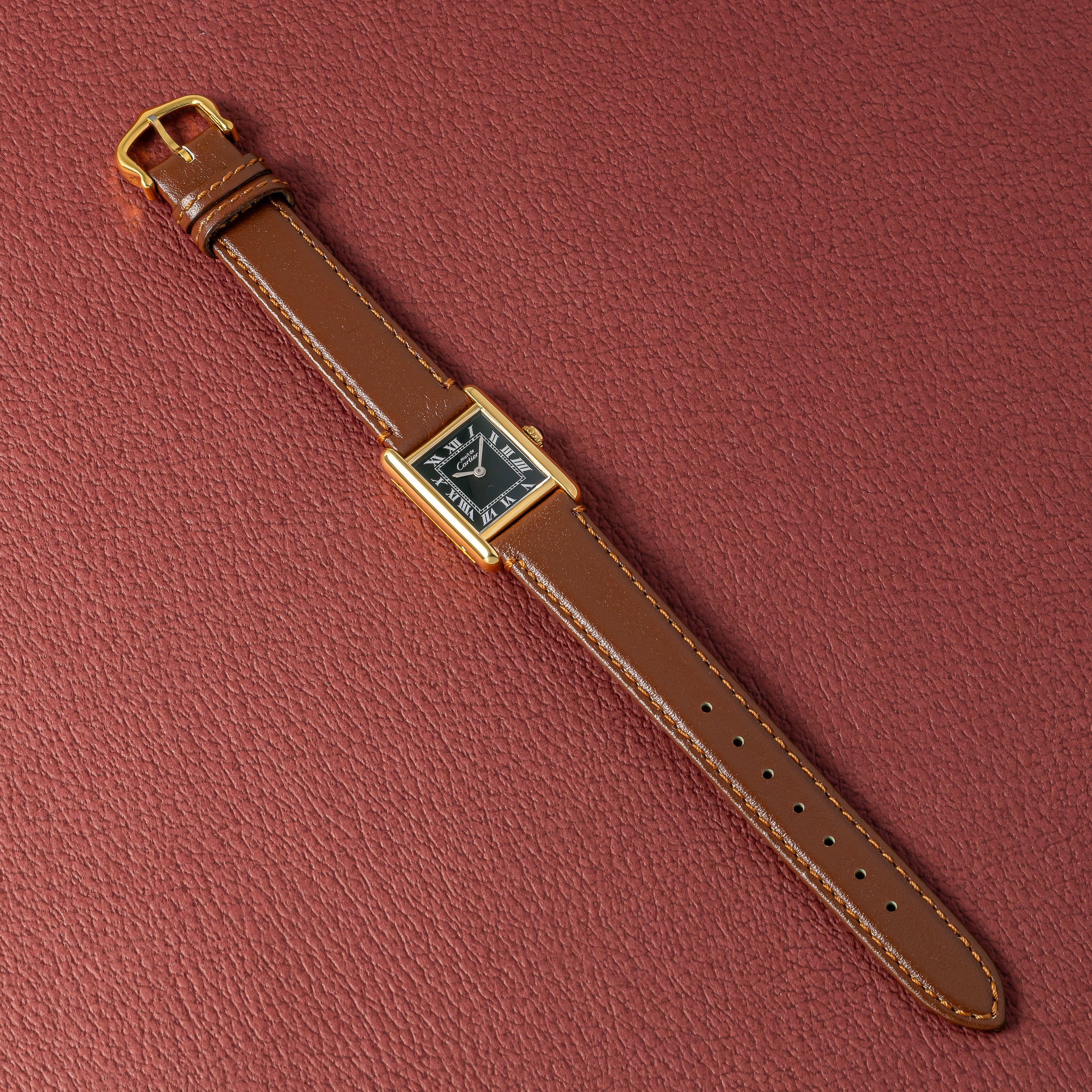 カルティエ マストタンク 1980年代製 SMサイズ ブラックローマンダイヤル 純正尾錠付き