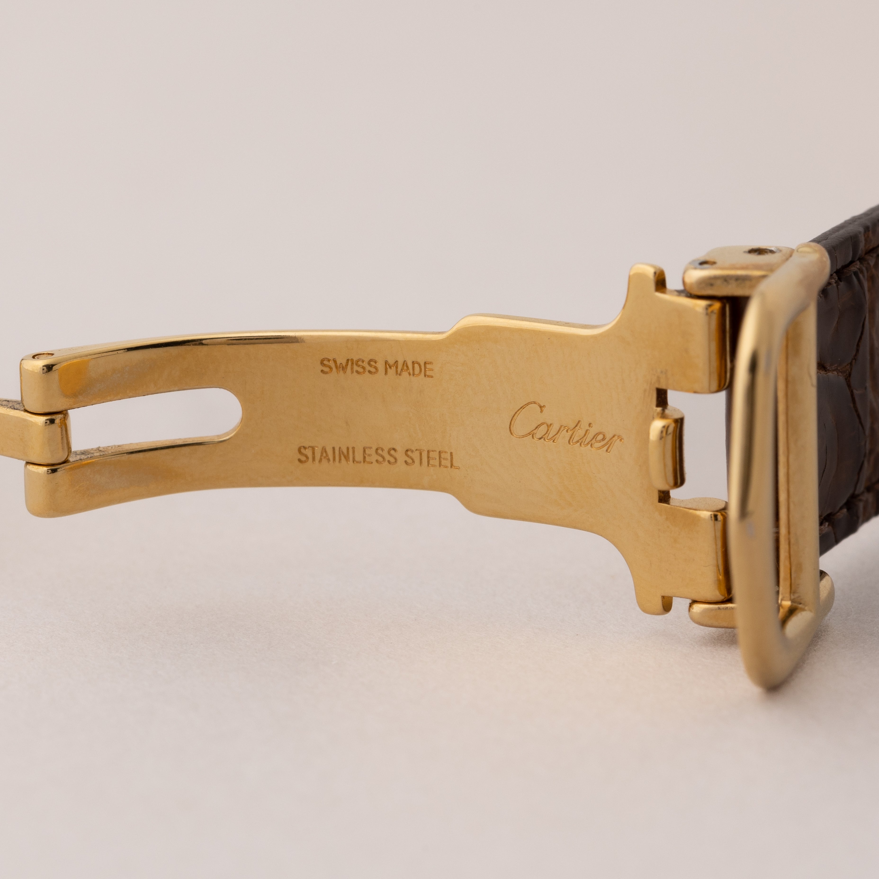 カルティエ マストタンク 1980年代製 ブラックローマンダイヤル 純正バックル付き