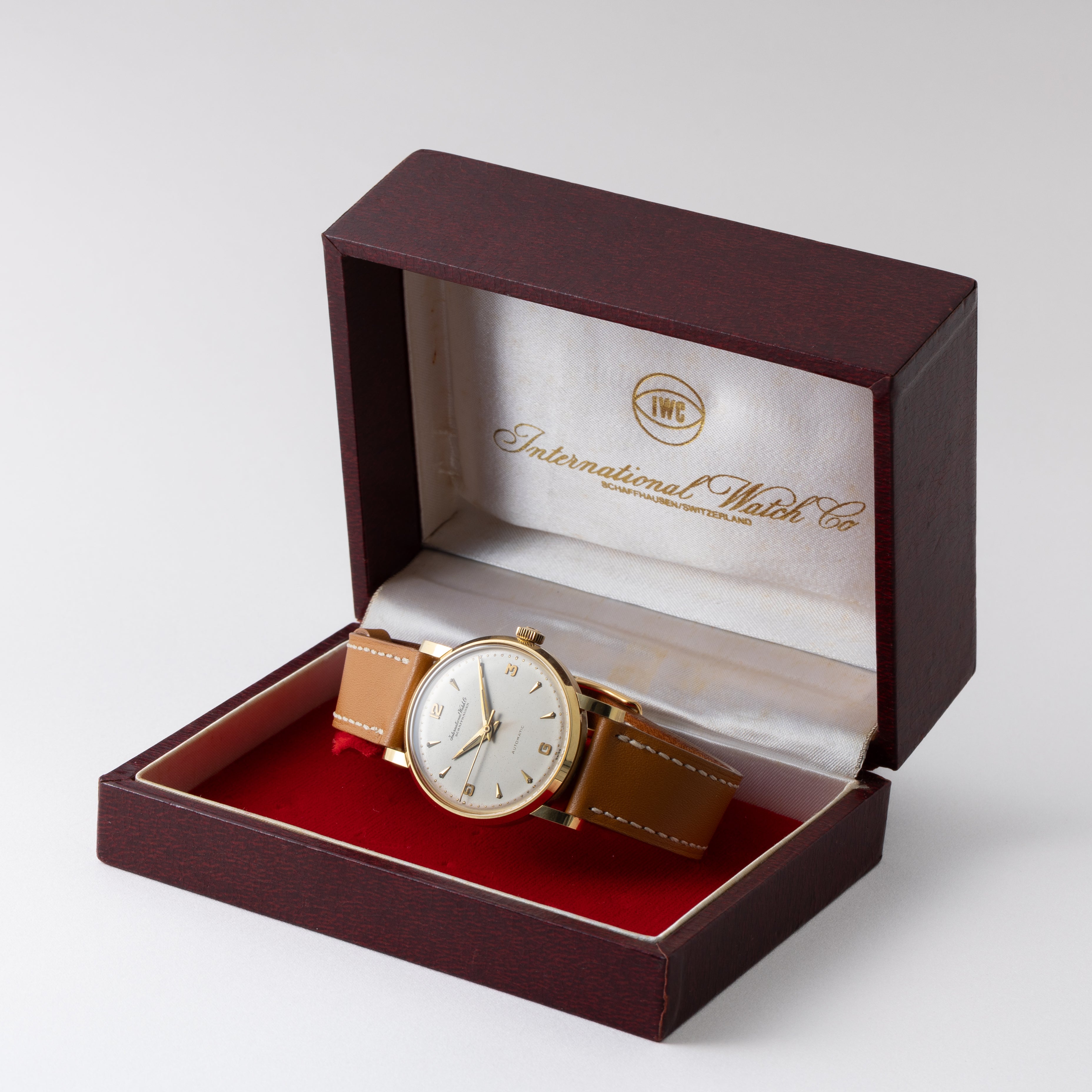 IWC 18金無垢ラウンドケース1957年製 箱、販売店ギャラ付き ペラトン式自動巻Cal.852