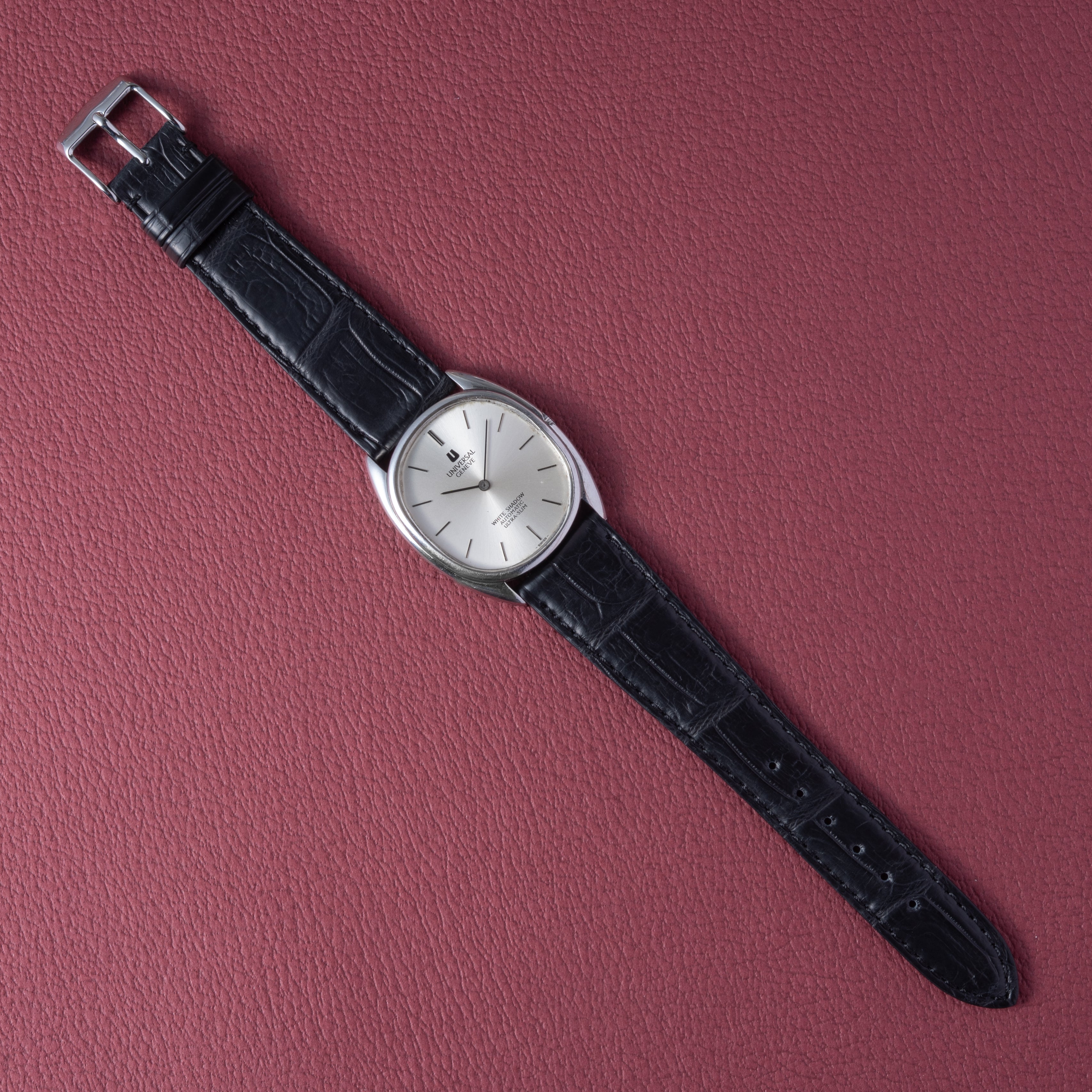 UNIVERSAL GENEVE ホワイトシャドウ ウルトラスリム（ジャンク） SELECT INC. [UNIVERSAL GENEVE ホワイトシャドウ ウルトラ