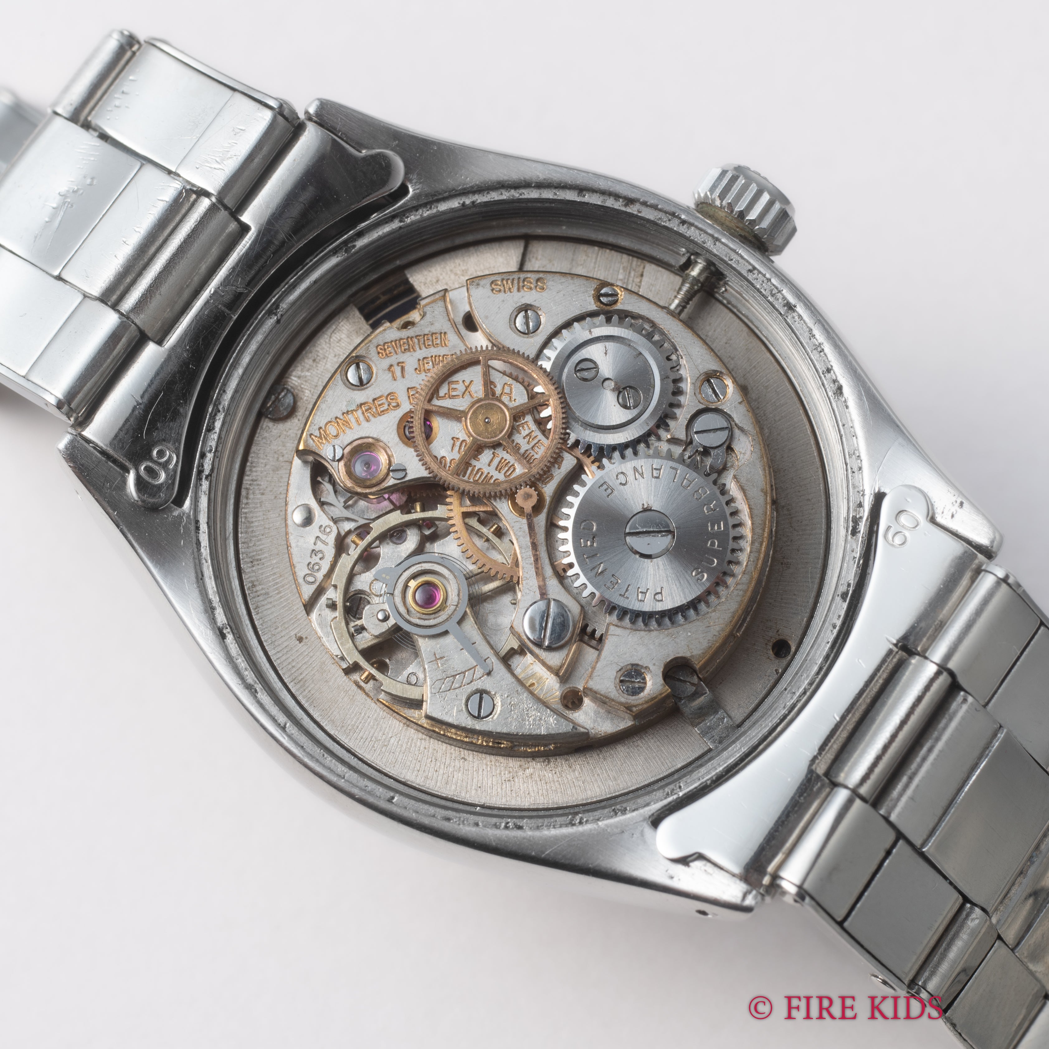 ロレックス オイスターデイト 1954年製 ブラックハニカムダイヤル 赤黒カレンダー Ref.6294 手巻 純正リベットブレス