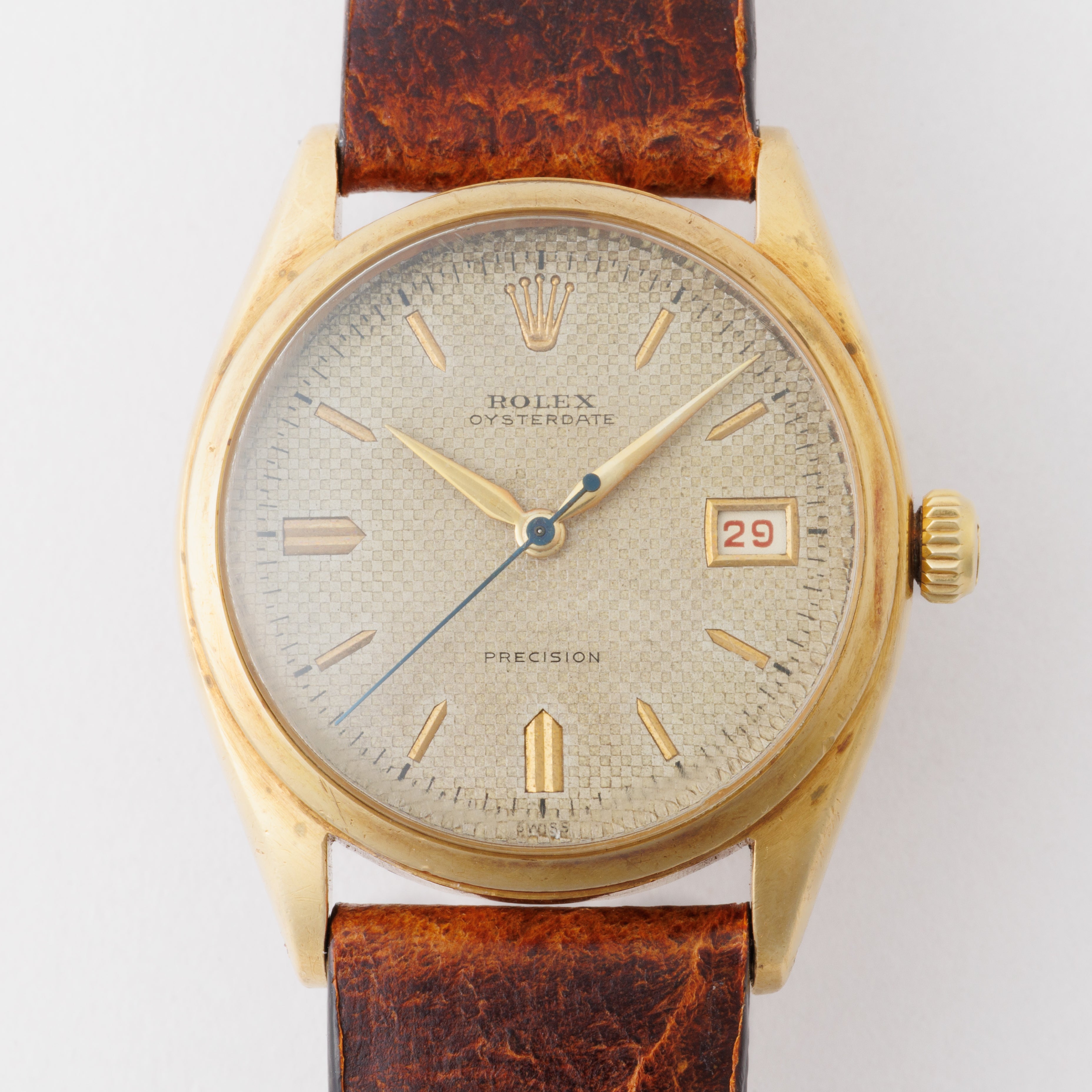 ロレックス 18金無垢オイスターデイトファーストモデル 1951年製 18KYG ワッフル彫り込みダイヤル 赤カレンダー