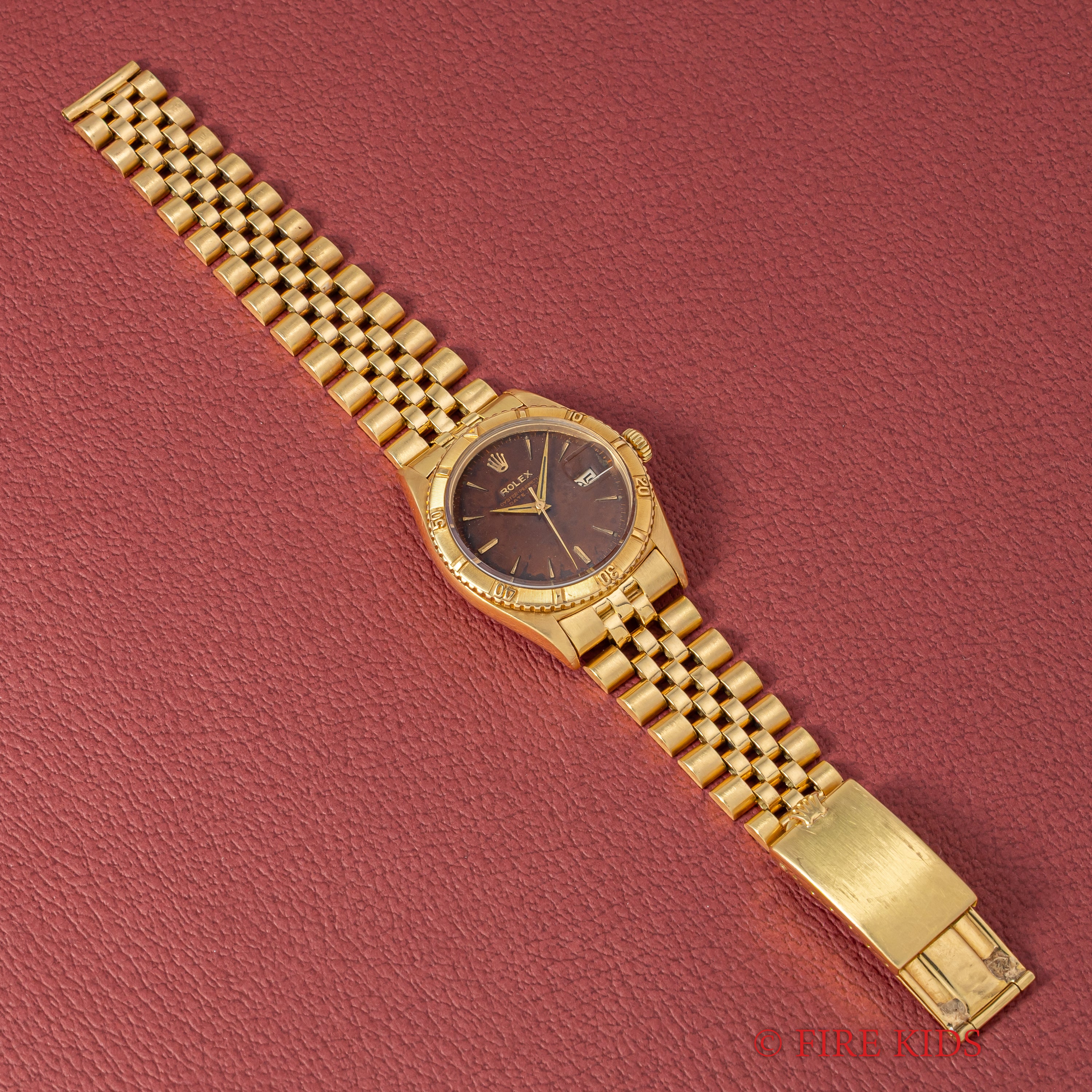 ロレックス 18金無垢サンダーバード オリジナルトロピカルダイヤル 1957年製 Ref.6609 赤黒カレンダー 純正金無垢ブレス