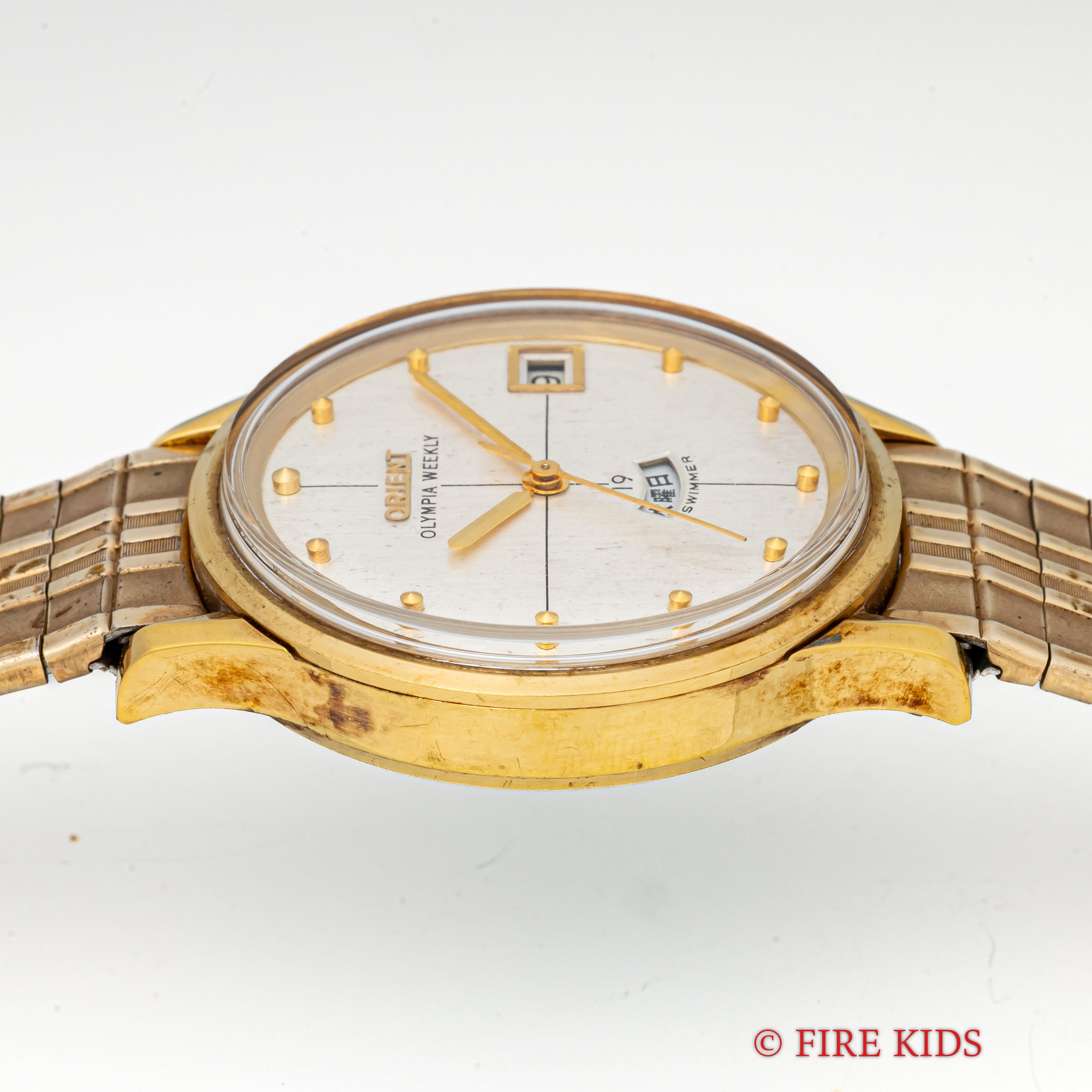 オリエント オリンピア ウィークリー クロスラインダイアル 1960年代 金張り デイデイト スイマー 19石 手巻