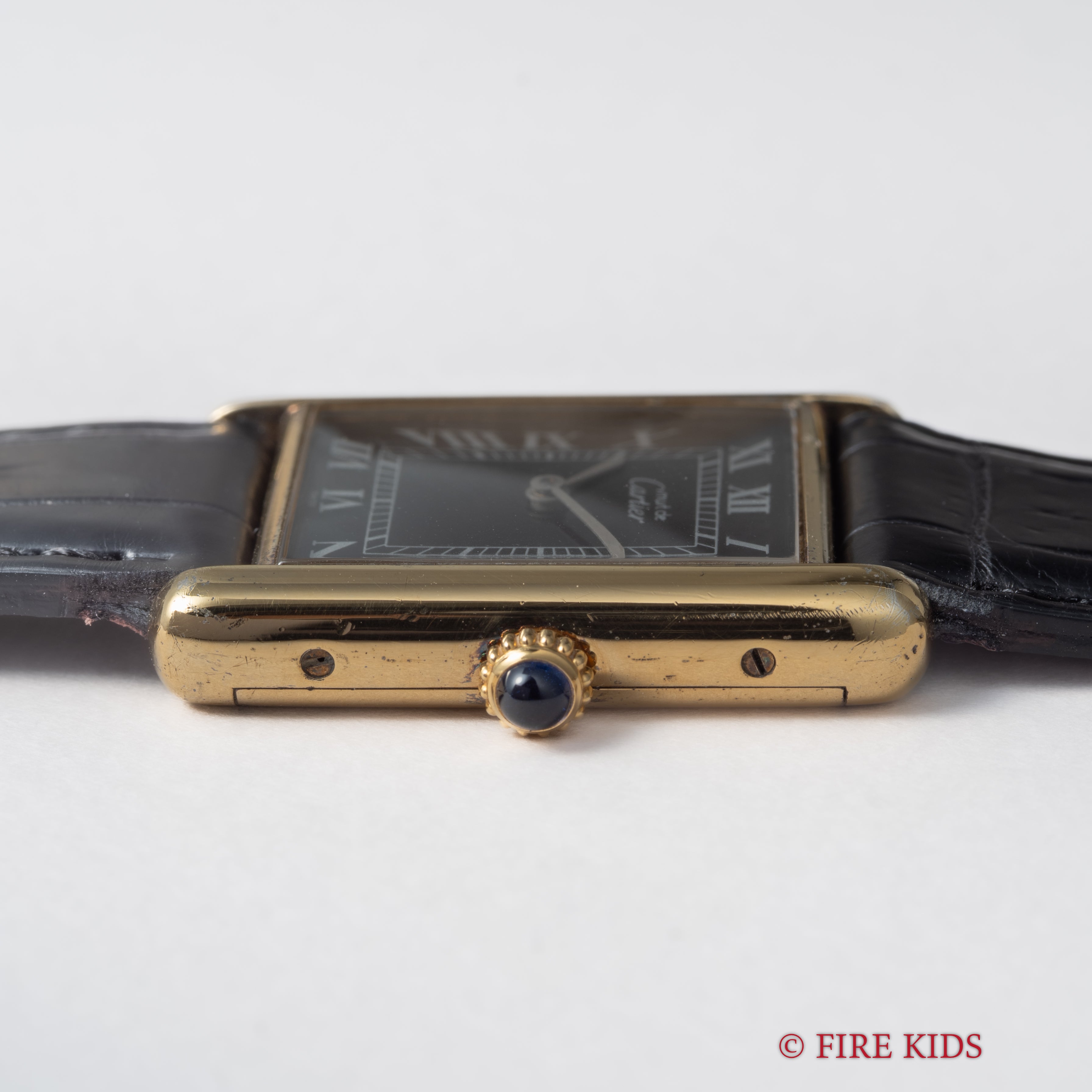 カルティエ マストタンク 1980年代製 LMサイズ ブラックローマンダイヤル 手巻 純正尾錠