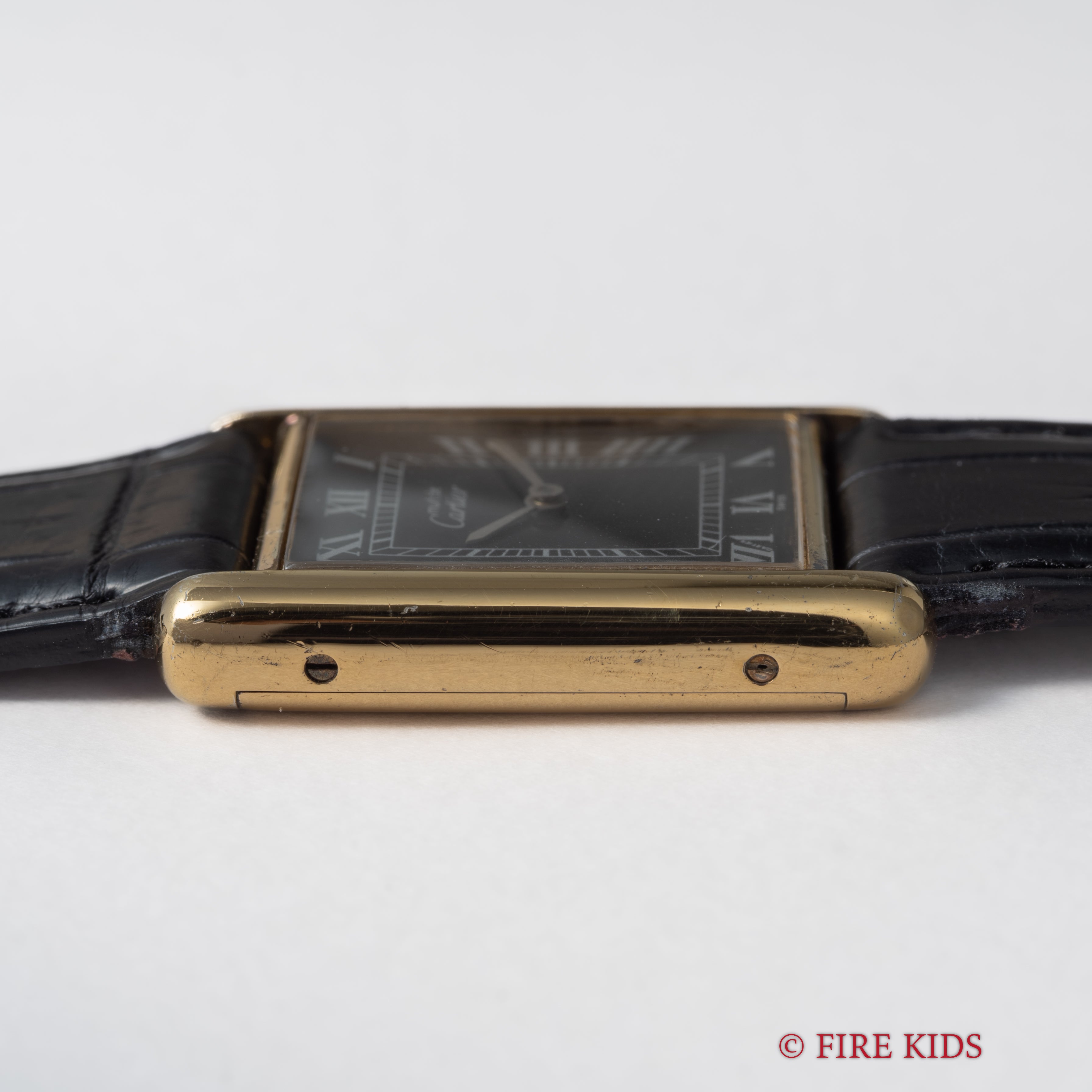 カルティエ マストタンク 1980年代製 LMサイズ ブラックローマンダイヤル 手巻 純正尾錠