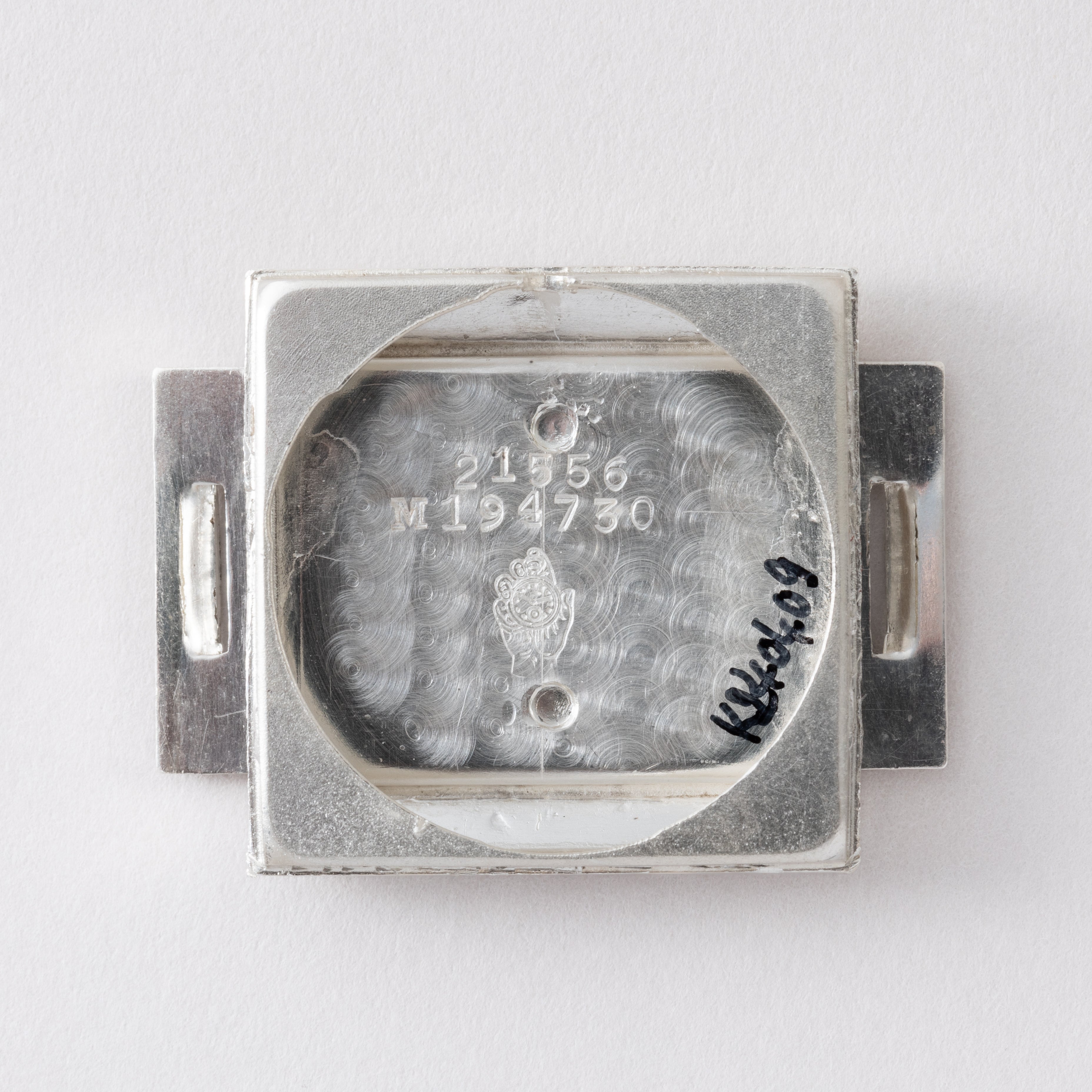 モバード エルメト 銀無垢ケース革巻き トラベルウォッチ 手巻き 1940 