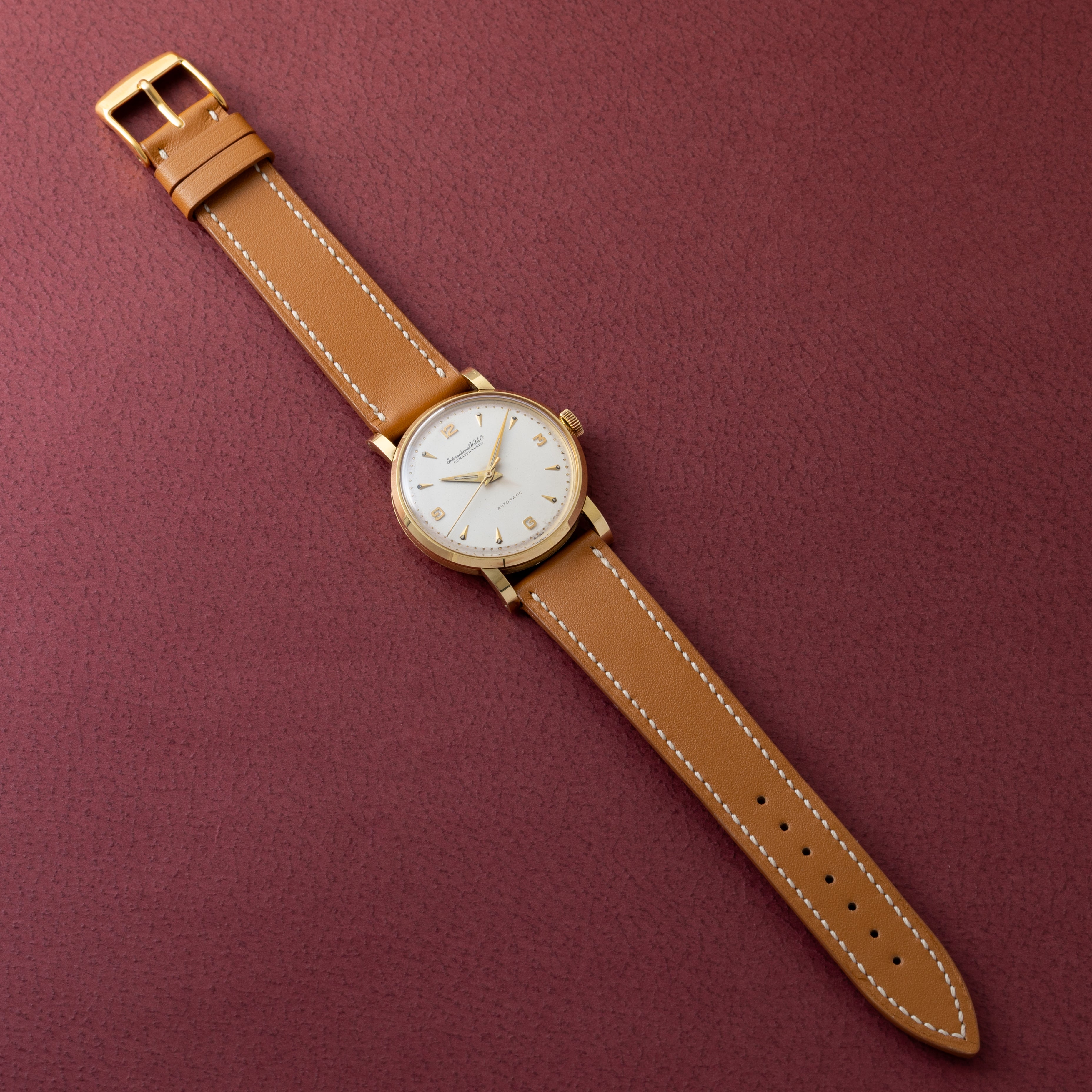 IWC 18金無垢ラウンドケース1957年製 箱、販売店ギャラ付き
