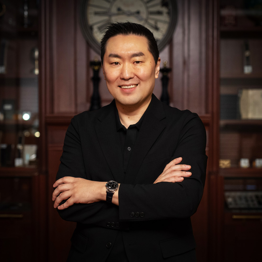 芦野 佳津雄